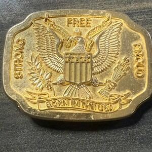 R.M. Foys Eagle Belt Buckle Born In‎ USA Strong Proud Free Gold Tone